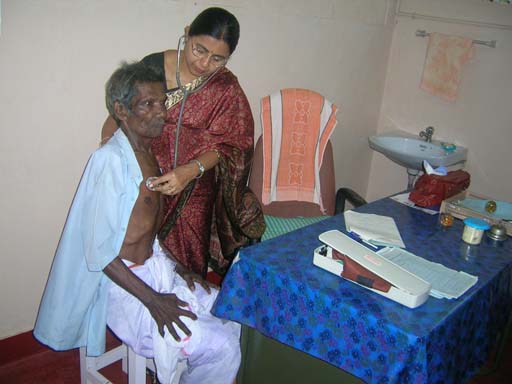 Dr.Geetha treating a patient.